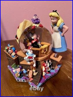50th Anniversary Disney Alice in Wonderland musical snow globe 50th Anniversary Disney Alice in Wonderland musical snow globe