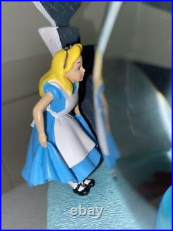 Alice In Wonderland disney snowglobe collectible