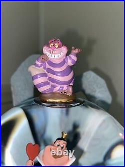 Alice In Wonderland disney snowglobe collectible