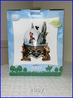 Alice In Wonderland disney snowglobe collectible