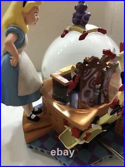 DISNEY Alice in Wonderland Figure Snow Globe Music Box Snow Dome Operationtested