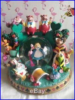 DISNEY Alice in Wonderland Rotating Snow Globe Music Box Figure Dancing Singing