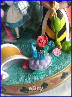 DISNEY Alice in Wonderland Rotating Snow Globe Music Box Figure Dancing Singing