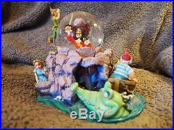 DISNEY'S PETER PAN & CAPTAIN HOOK MUSICAL SNOW GLOBE that plays You Can Fly