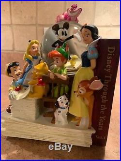 DISNEY Through the Years Volume 1 & 2 Snowglobes Bookends Music Box