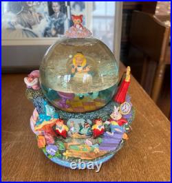 Disney Alice in Wonderland Drink Me All in the Golden Afternoon Music Snow Globe Disney Alice in Wonderland Drink Me All in the Golden Afternoon Music Snow Globe