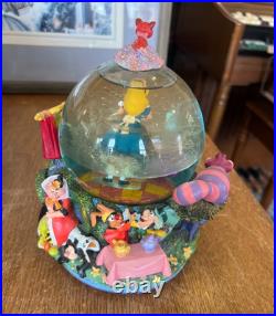 Disney Alice in Wonderland Drink Me All in the Golden Afternoon Music Snow Globe Disney Alice in Wonderland Drink Me All in the Golden Afternoon Music Snow Globe
