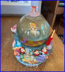 Disney Alice in Wonderland Drink Me All in the Golden Afternoon Music Snow Globe Disney Alice in Wonderland Drink Me All in the Golden Afternoon Music Snow Globe