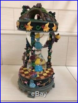 Disney Alice in Wonderland Hourglass Snowglobe and Music and Glitter. RARE Item