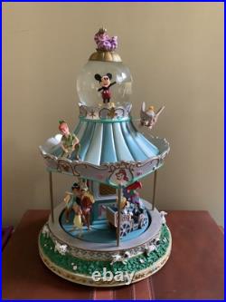Disney Alice in Wonderland Multicharacter Carousel Musical Snow Globe rare Disney Alice in Wonderland Multicharacter Carousel Musical Snow Globe rare