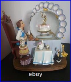 Disney Beauty & The Beast plates snow-globe rare and it is beautiful