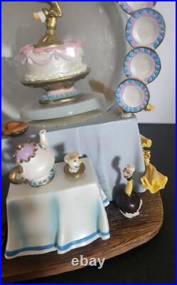Disney Beauty & The Beast plates snow-globe rare and it is beautiful
