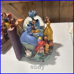 Disney Classics Vol 1 & 11 Through the Years Musical Snow Globe Bookend READ Disney Classics Vol 1 & 11 Through the Years Musical Snow Globe Bookend READ