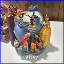 Disney Classics Vol 1 & 11 Through the Years Musical Snow Globe Bookend READ Disney Classics Vol 1 & 11 Through the Years Musical Snow Globe Bookend READ