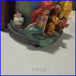 Disney Classics Vol 1 & 11 Through the Years Musical Snow Globe Bookend READ Disney Classics Vol 1 & 11 Through the Years Musical Snow Globe Bookend READ