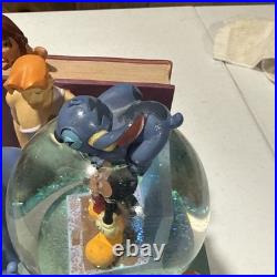 Disney Classics Vol 1 & 11 Through the Years Musical Snow Globe Bookend READ Disney Classics Vol 1 & 11 Through the Years Musical Snow Globe Bookend READ