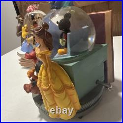Disney Classics Vol 1 & 11 Through the Years Musical Snow Globe Bookend READ Disney Classics Vol 1 & 11 Through the Years Musical Snow Globe Bookend READ