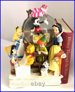 Disney Classics Vol 1 Through the Years Musical Snow Globe Bookend Disney Classics Vol 1 Through the Years Musical Snow Globe Bookend