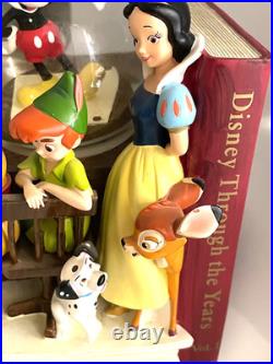 Disney Classics Vol 1 Through the Years Musical Snow Globe Bookend Disney Classics Vol 1 Through the Years Musical Snow Globe Bookend