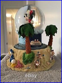Disney Cruise Line Snow Globe with two Cruise Line ships encircling the globe