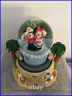 Disney Cruise Line Snow Globe with two Cruise Line ships encircling the globe