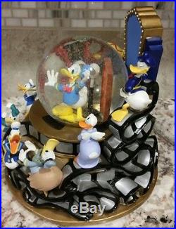 Disney Donald Duck THROUGH THE YEARS Large Musical Light Up Motion SnowGlobe