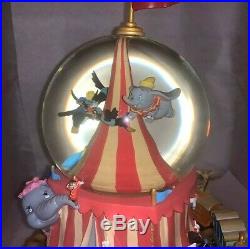 Disney Flying Dumbo Musical Snowglobe With Moving Train Clowns Circus NEVER OPENED