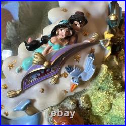 Disney Four Parks One World Monorail Musical Snow Globe Plays Zip-a-dee-doo-dah