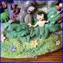 Disney Four Parks One World Monorail Musical Snow Globe Plays Zip-a-dee-doo-dah