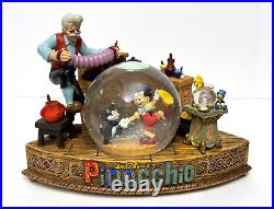 Disney Geppetto's Workshop Pinocchio Snow globe Music Box Working Excellent