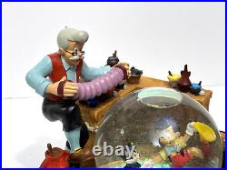 Disney Geppetto's Workshop Pinocchio Snow globe Music Box Working Excellent