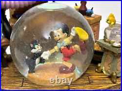 Disney Geppetto's Workshop Pinocchio Snow globe Music Box Working Excellent