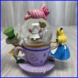 Disney Parks Exclusive Alice in Wonderland Spinning Tea Cup Snow Globe Boxed. PB