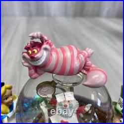 Disney Parks Exclusive Alice in Wonderland Spinning Tea Cup Snow Globe Boxed. PB