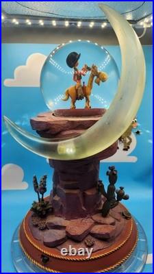 Disney Pecos Bill And Widowmaker Pedestal Snow Globe And Music Box