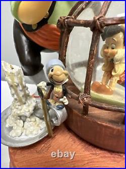 Disney Pinocchio & Stromboli 8.5 Musical Snow Globe Box Works Jiminy Cricket