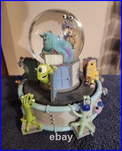 Disney Pixar Monsters Inc Rotating Musical Snow Globe
