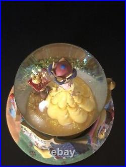 Disney Princesses Story Book Rotating Snow Globe. Belle