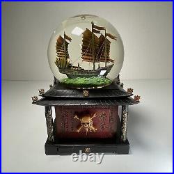 Disney Snow Globe Pirates of the Caribbean At World's End WithKey Lights Up Music