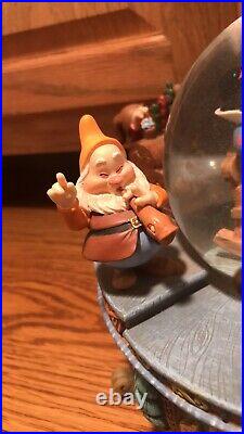 Disney-Snow White 7 Dwarf Musical Snow Globe Reading Book Whistle a Happy Tune