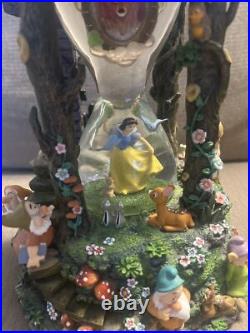 Disney Snow White & The Seven Dwarfs Hourglass Snow Globe with Lights & Sound Disney Snow White & The Seven Dwarfs Hourglass Snow Globe with Lights & Sound