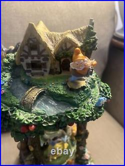 Disney Snow White & The Seven Dwarfs Hourglass Snow Globe with Lights & Sound Disney Snow White & The Seven Dwarfs Hourglass Snow Globe with Lights & Sound