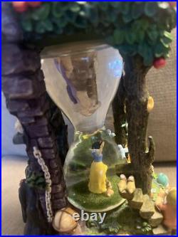 Disney Snow White & The Seven Dwarfs Hourglass Snow Globe with Lights & Sound Disney Snow White & The Seven Dwarfs Hourglass Snow Globe with Lights & Sound
