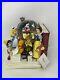 Disney_Store_Through_The_Years_Vol_1_Musical_Snow_Globe_and_Bookend_01_sq