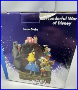 Disney Store Wonderful World of Disney Set of 2 Book End Snow Globes HandPainted Disney Store Wonderful World of Disney Set of 2 Book End Snow Globes HandPainted
