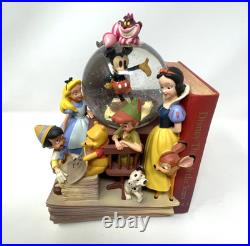 Disney Store Wonderful World of Disney Set of 2 Book End Snow Globes HandPainted Disney Store Wonderful World of Disney Set of 2 Book End Snow Globes HandPainted