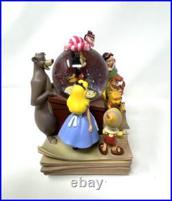Disney Store Wonderful World of Disney Set of 2 Book End Snow Globes HandPainted Disney Store Wonderful World of Disney Set of 2 Book End Snow Globes HandPainted
