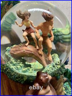 Disney Tarzan and Jane Jungle Theme Two Worlds Rotating Musical Glass Snow Globe