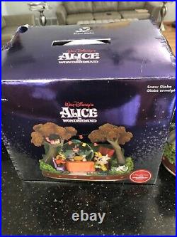 Disney alice in wonderland snowglobe in original box