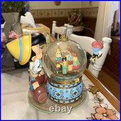 Disney's Pinocchio's Music Box Water Globe Snow Globe with tags